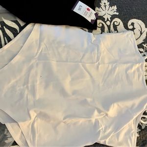 New white crotch-close adjustable spaghetti-strap onesie.